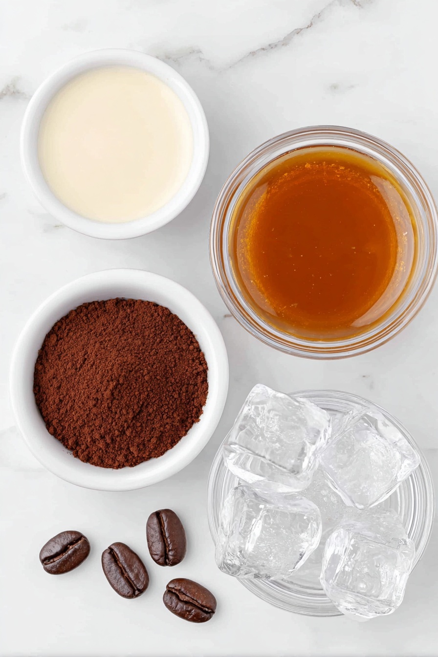 Flat lay of a small white bowl filled with smooth oat milk creamer, a small white bowl containing thick cinnamon simple syrup, a freshly brewed espresso shot in a simple white ceramic cup, a handful of clear ice cubes scattered neatly, a small white bowl with fine cacao powder, and three glossy whole coffee beans arranged in a line on the white marble surface, placed on a clean white marble surface, soft natural light, photo taken with an iPhone, professional food photography style, fresh ingredients, white ceramic bowls, no bottles, no duplicates, no utensils, no packaging --ar 2:3 --v 7 --p m7354615311229779997