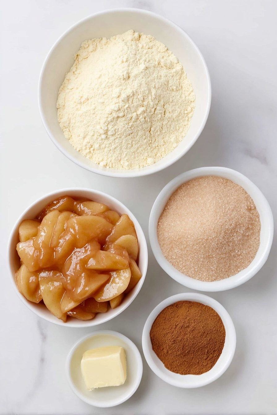 Flat lay of two small white ceramic bowls of glossy apple pie filling with visible apple slices, a simple white ceramic bowl filled with pale yellow gluten-free yellow cake mix powder, a small white ceramic bowl holding packed light brown sugar crystals, a small white ceramic bowl containing warm golden melted butter, and a small white ceramic bowl with fine cinnamon powder, all arranged symmetrically and balanced, placed on a clean white marble surface, soft natural light, photo taken with an iPhone, professional food photography style, fresh ingredients, white ceramic bowls, no bottles, no duplicates, no utensils, no packaging --ar 2:3 --v 7 --p m7354615311229779997